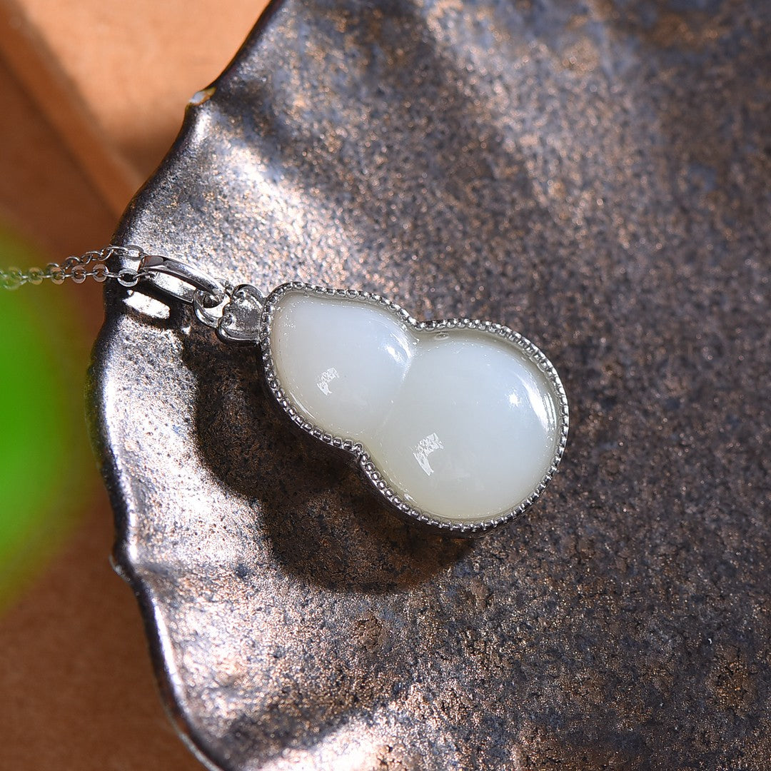 Silver inlaid Hetian jade gourd pendant