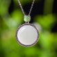 Silver inlaid Hetian jade pendant