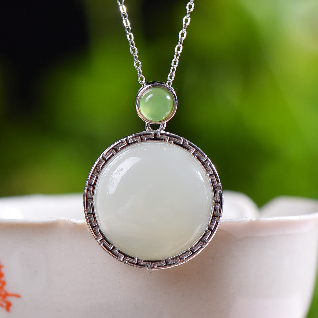 Silver inlaid Hetian jade pendant