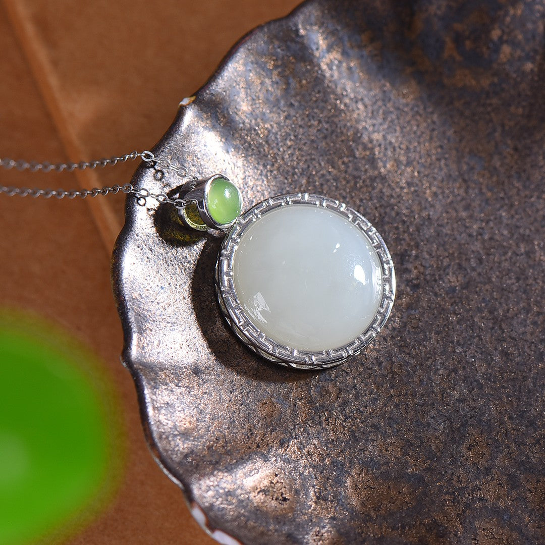 Silver inlaid Hetian jade pendant