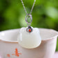 Silver inlaid Hetian jade Ruyi lock pendant