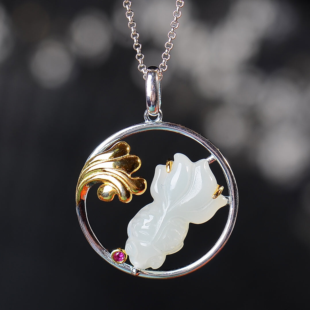 Silver inlaid Hetian jade fish pendant every year