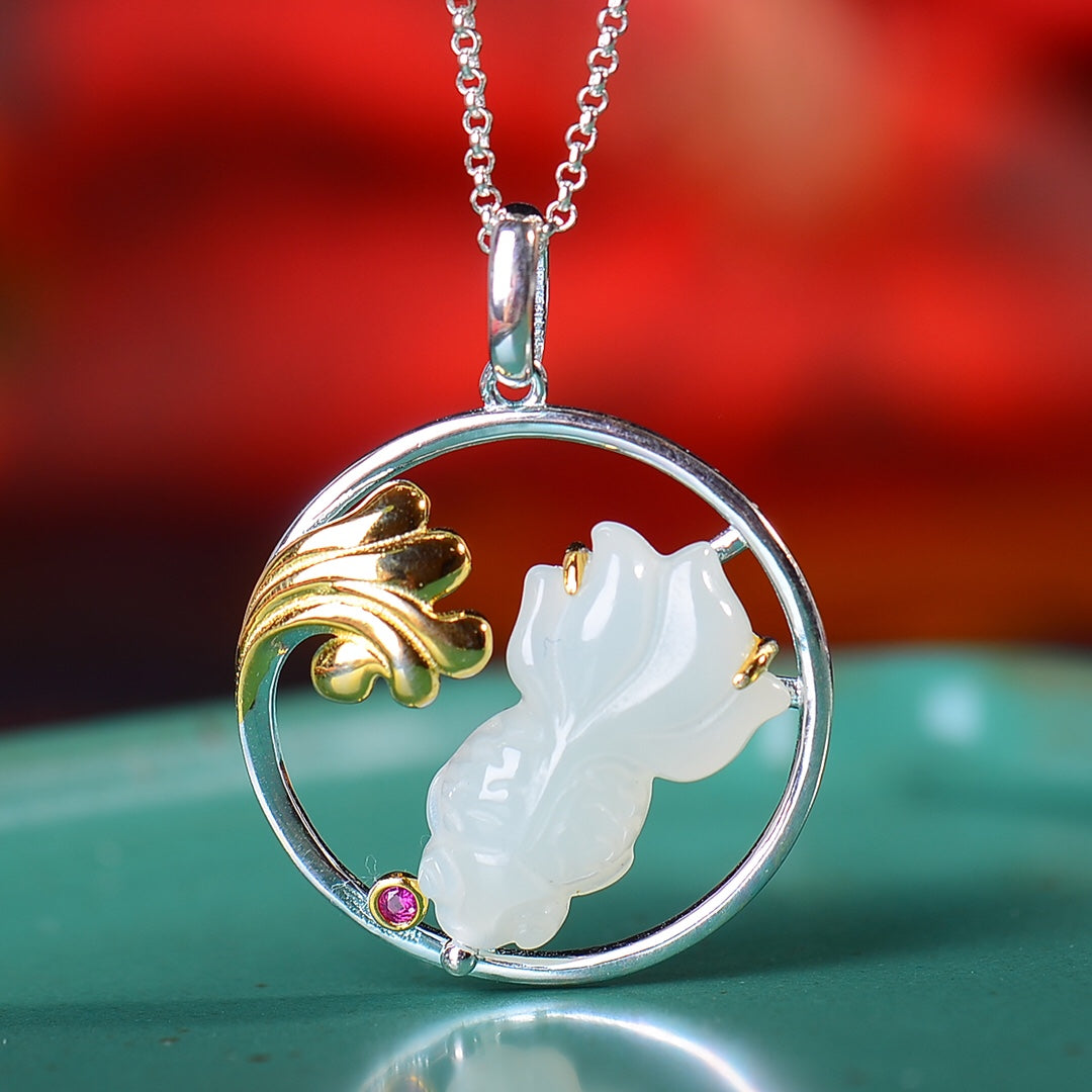 Silver inlaid Hetian jade fish pendant every year