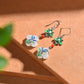 Silver inlaid Hetian jade enamel four-leaf clover earrings