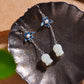 Silver inlaid Hetian jade and pomegranate flower enamel earrings