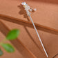 Silver inlaid Hetian jade redbud tassel hairpin