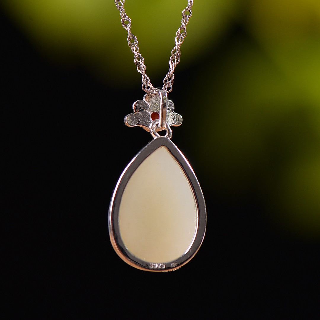 Silver inlaid Hetian jade enamel water drop pendant