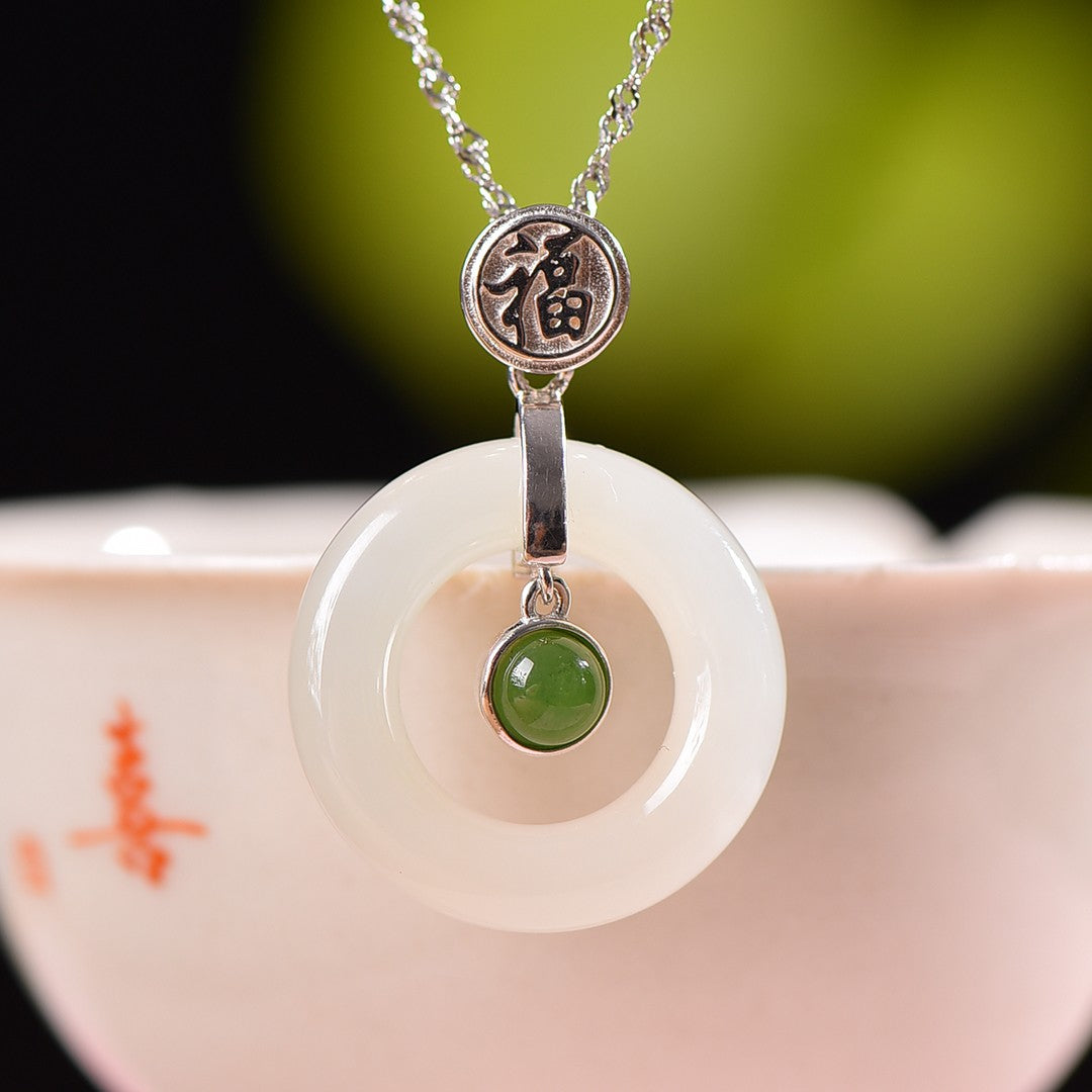 Silver inlaid Hetian jade peace ring pendant