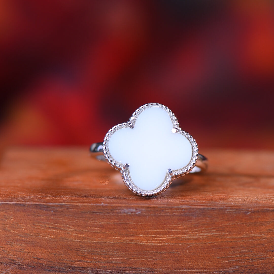 Silver inlaid Hetian jade fine four-leaf clover ring