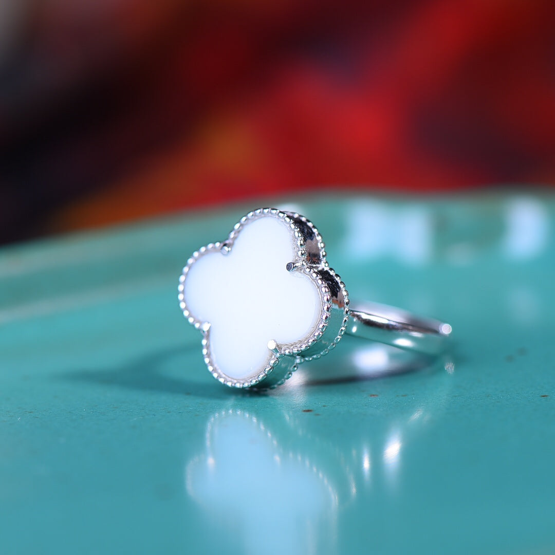 Silver inlaid Hetian jade fine four-leaf clover ring