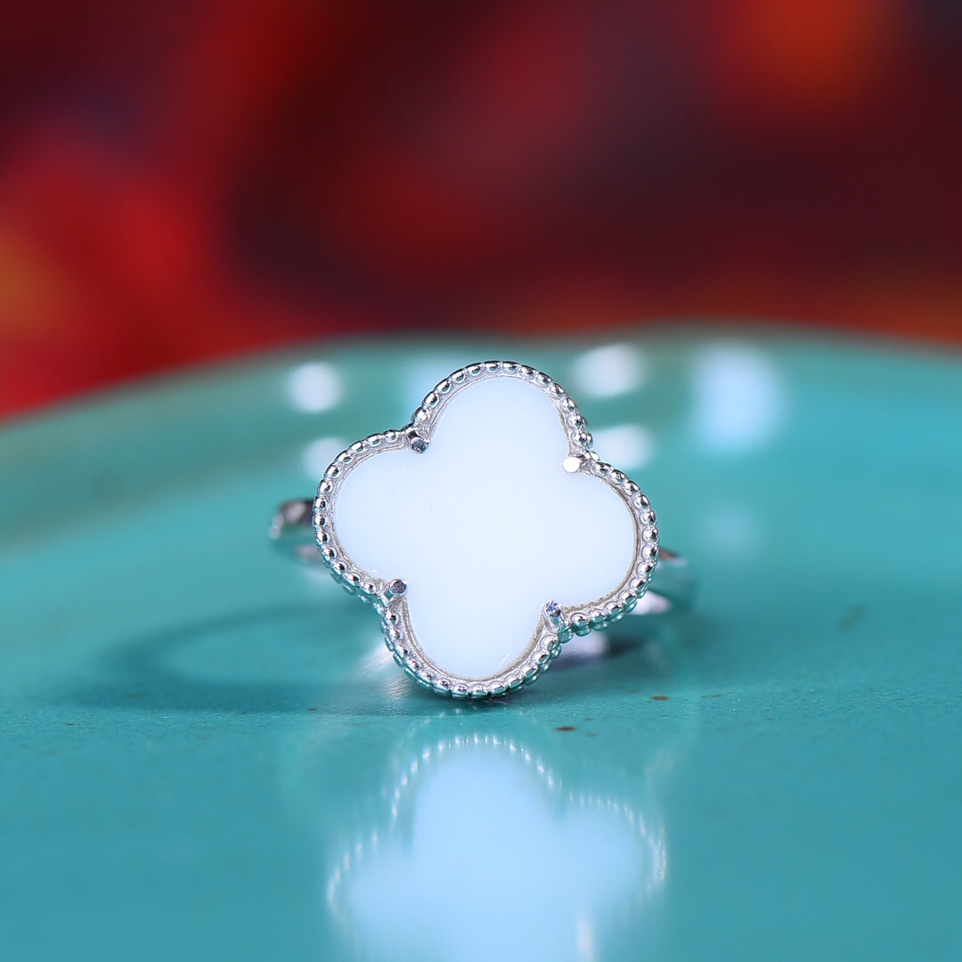 Silver inlaid Hetian jade fine four-leaf clover ring