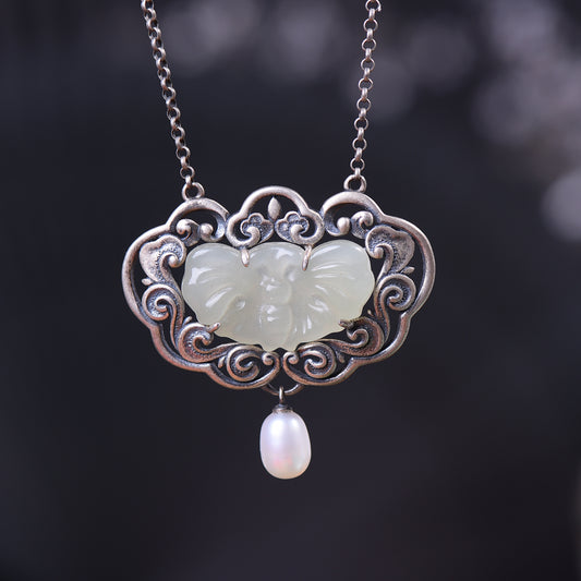 Silver inlaid Hetian jade pendant