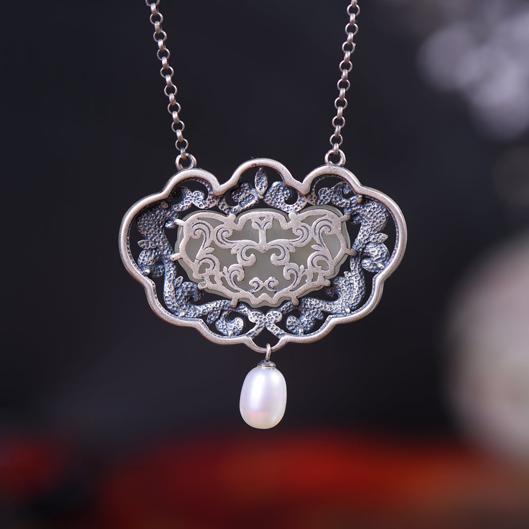 Silver inlaid Hetian jade pendant