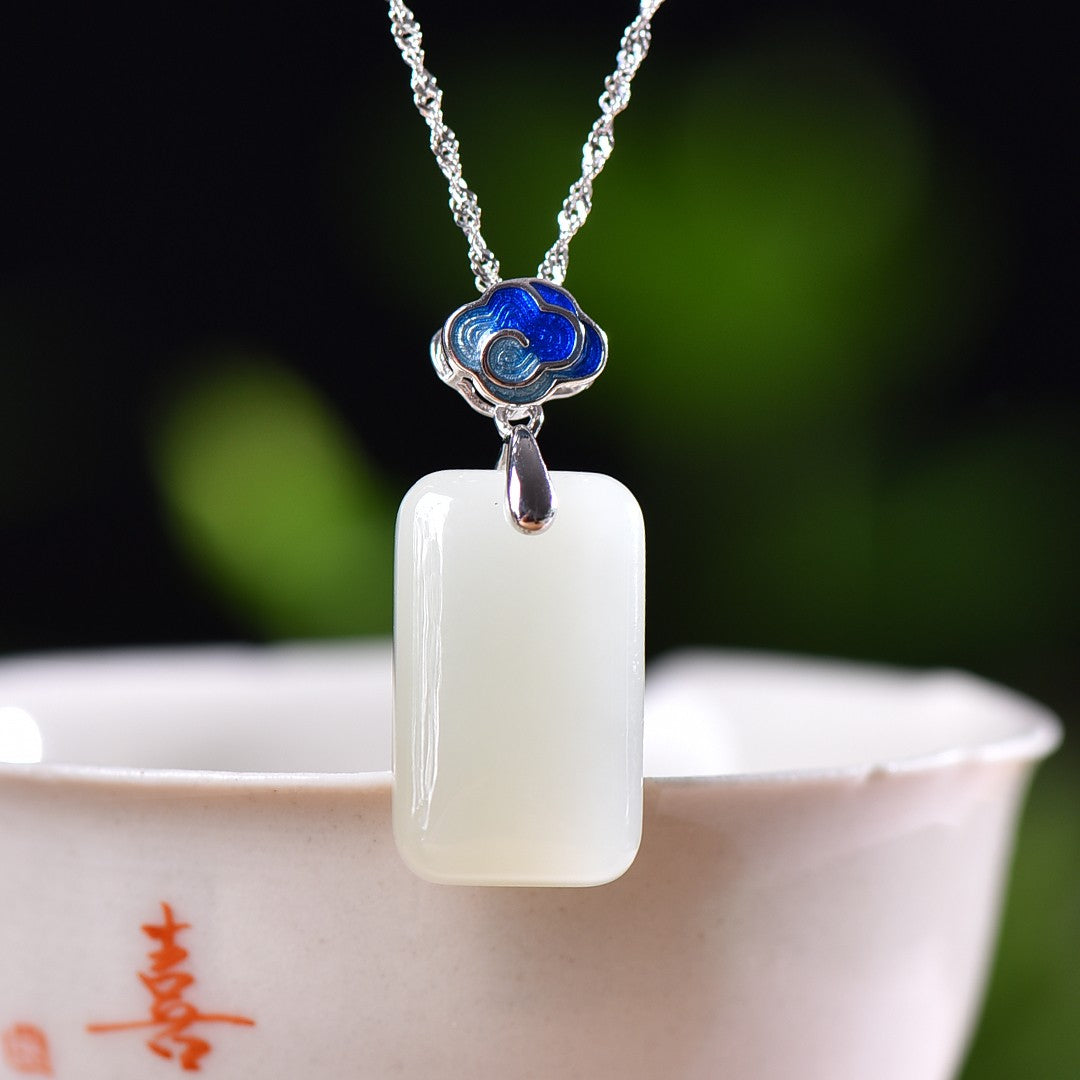 Silver inlaid Hetian jade pendant