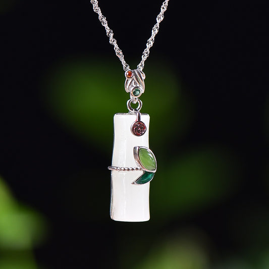 Silver inlaid Hetian jade pendant