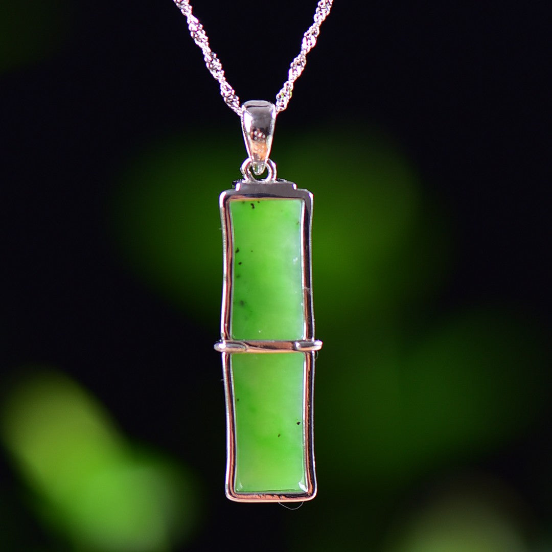 Silver inlaid Hetian jade pendant