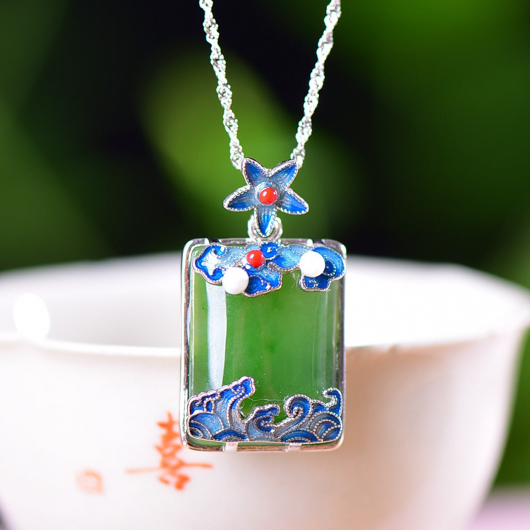 Silver inlaid Hetian jade pendant