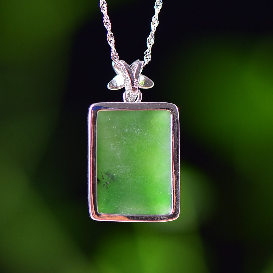 Silver inlaid Hetian jade pendant