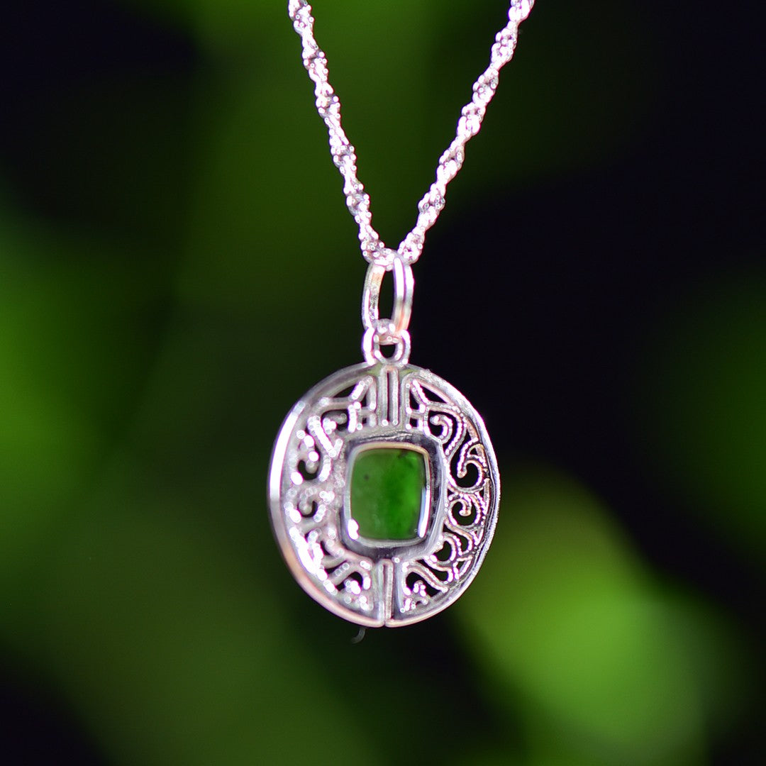 Silver inlaid Hetian jade pendant