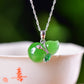 Silver inlaid Hetian jade pendant