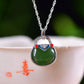 Silver inlaid Hetian jade pendant