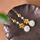 Silver gold-plated inlaid Hetian jade and multi-treasure earrings