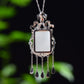 Silver inlaid Hetian jade pendant