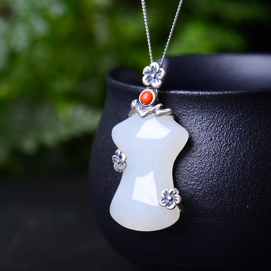 Silver inlaid Hetian jade pendant