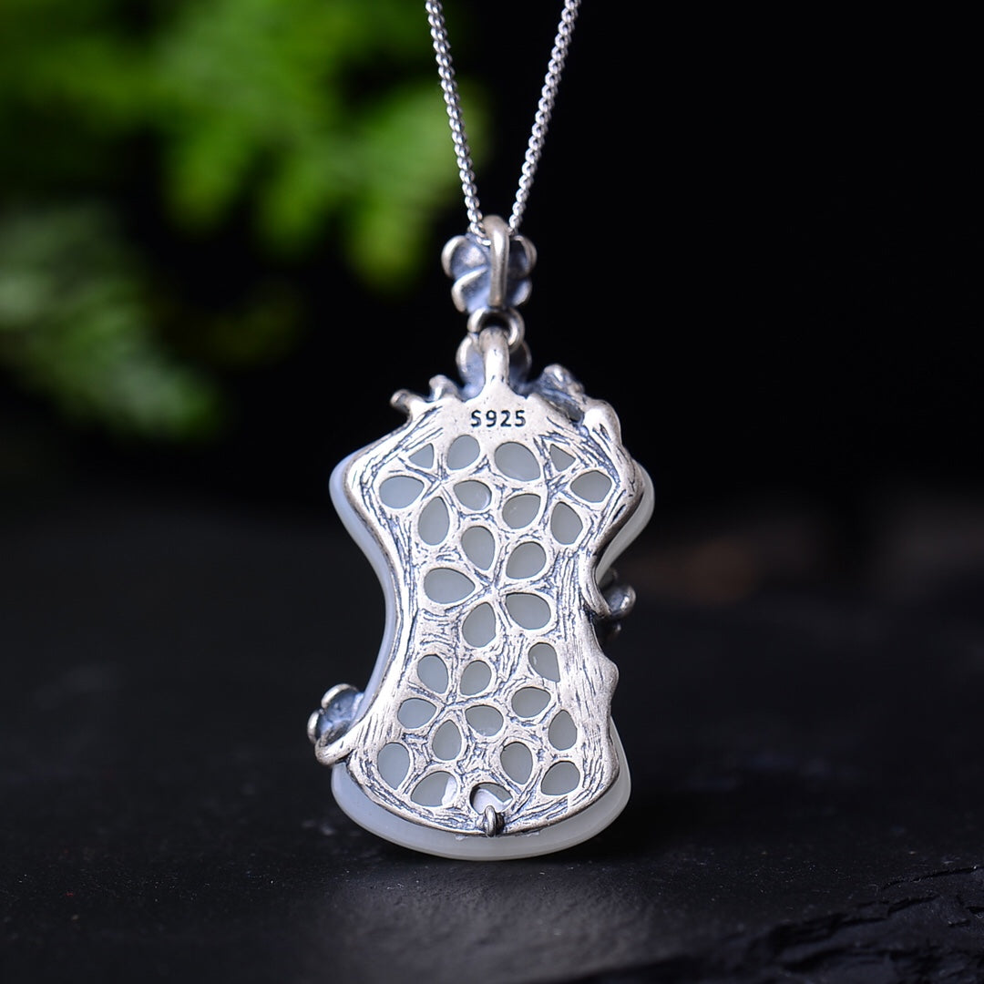 Silver inlaid Hetian jade pendant