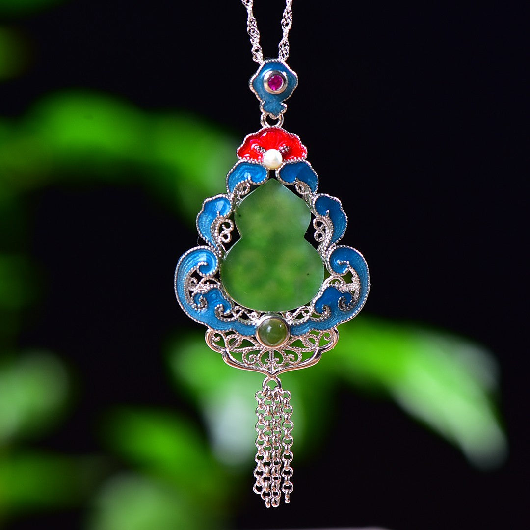 Silver inlaid Hetian jade pendant