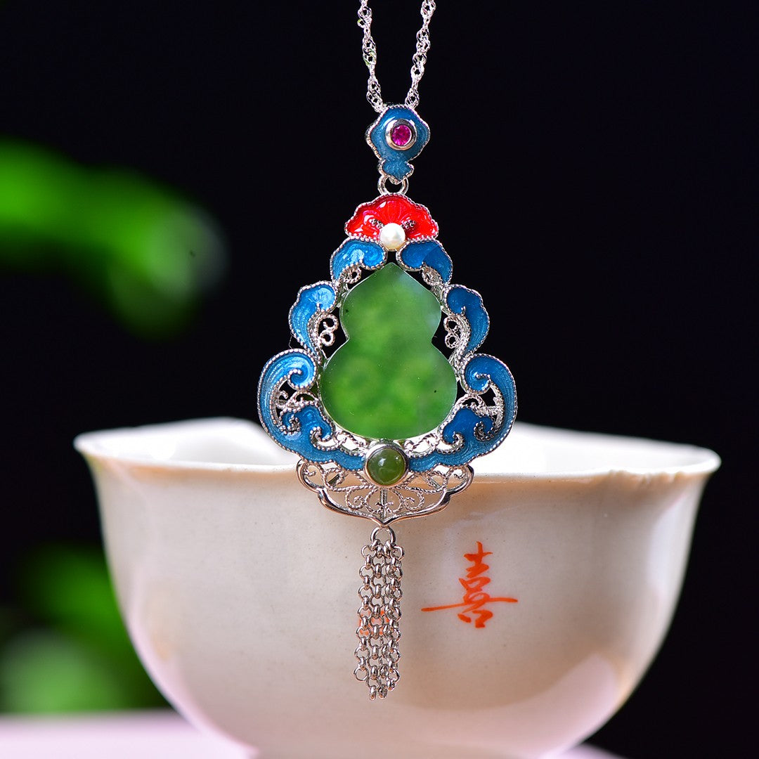 Silver inlaid Hetian jade pendant