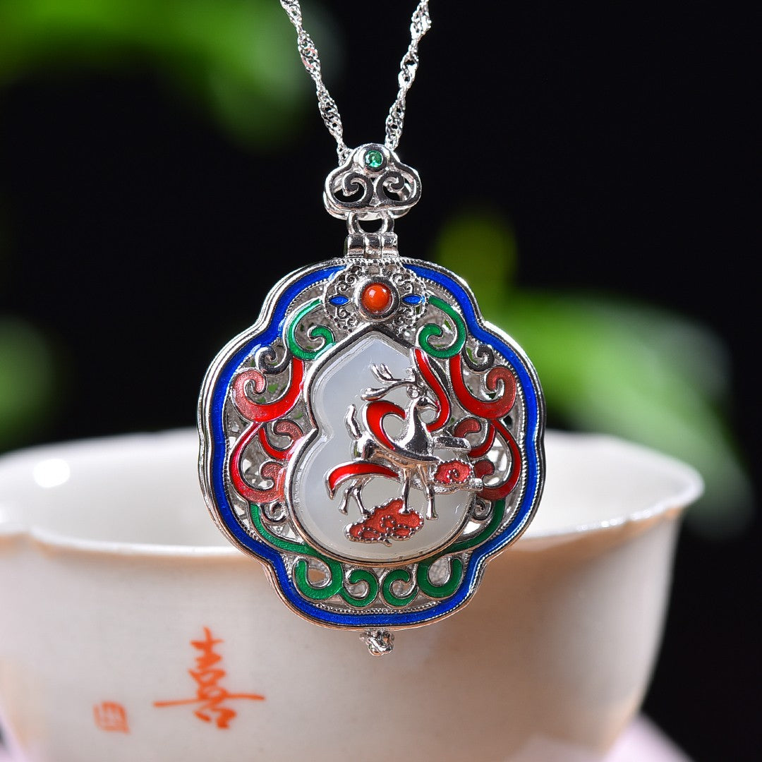 Silver inlaid Hetian jade pendant