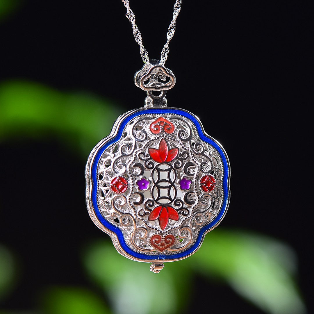 Silver inlaid Hetian jade pendant